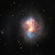 Webb's image of the same galaxy is more colorful in red and blue light.